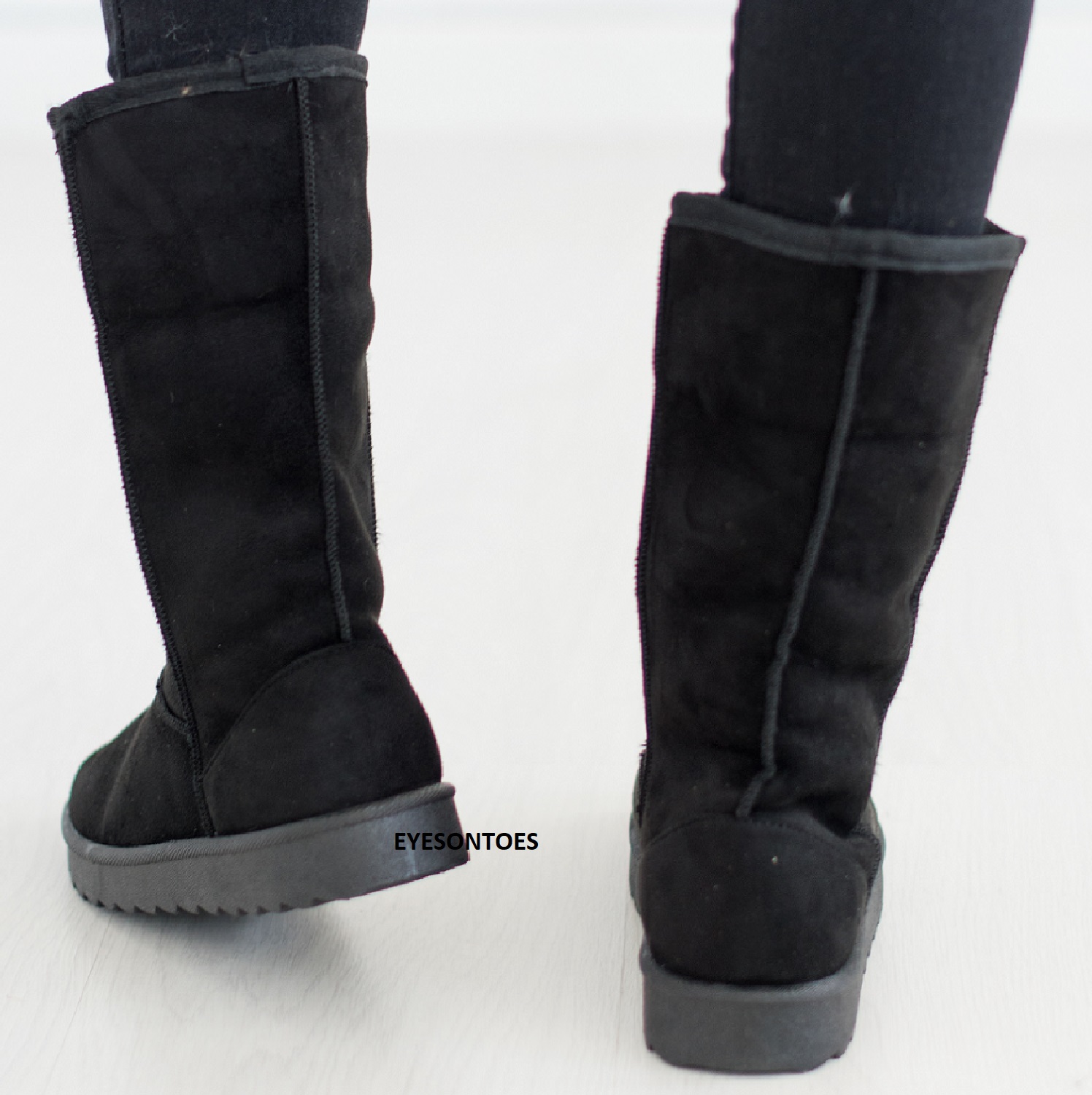 black calf hugging boots